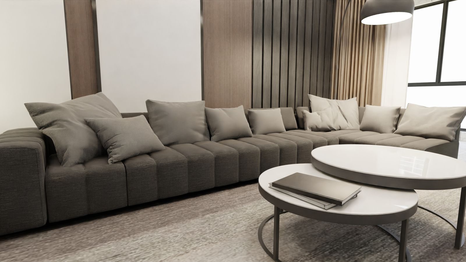 A bright modern living room with a clean grey corner sofa